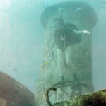 Patty pauses on the stack of a Miami wreck